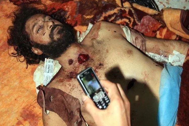 Fiul lui Muammar Gaddafi, executat dupa ce a primit o tigara VIDEO