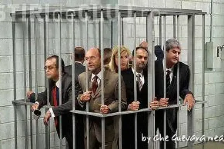 Aceasta este poza zilei pe Facebook! Basescu si Boc dupa gratii FOTO