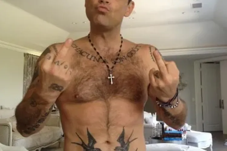 Robbie Williams devine tatic 