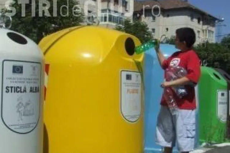 Tiganii fura, la Cluj, deseurile colectate selectiv in clopotele stradale VIDEO
