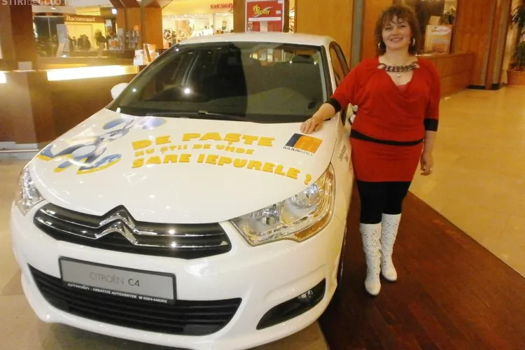 Un milion de clienti la Iulius Mall Cluj! O clujeanca a castigat de la Iulius Mall un Citroen C4