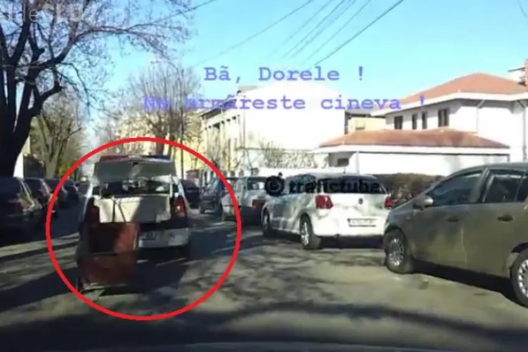 Politistii trag dupa masina un carucior si cara un dulap cu masina de politie VIDEO