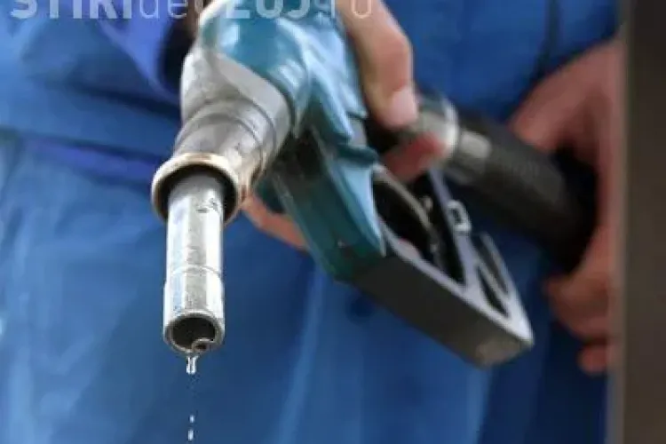 Benzina se scumpeste cu cel putin 15%