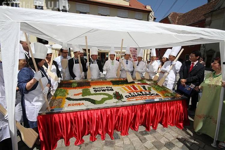 Cel mai mare bibimbap din Romania, o mancare coreeana, va fi preparat in Piata Muzeului FOTO