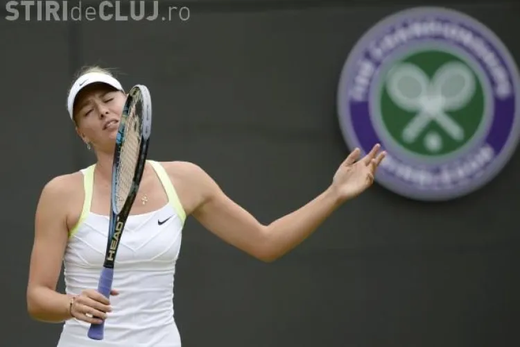 Imaginea zilei la Wimbledon! Şarapova înfășurată în prosoape FOTO