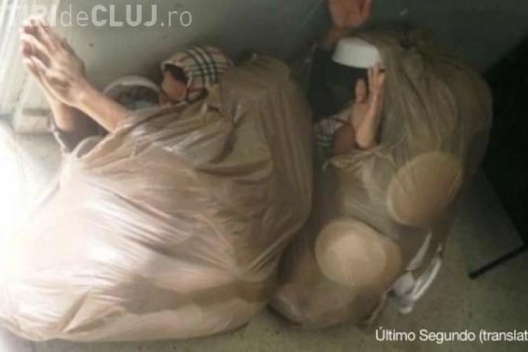 Doi deţinuţi au încercat să evadeze ascunzându-se în saci de gunoi
