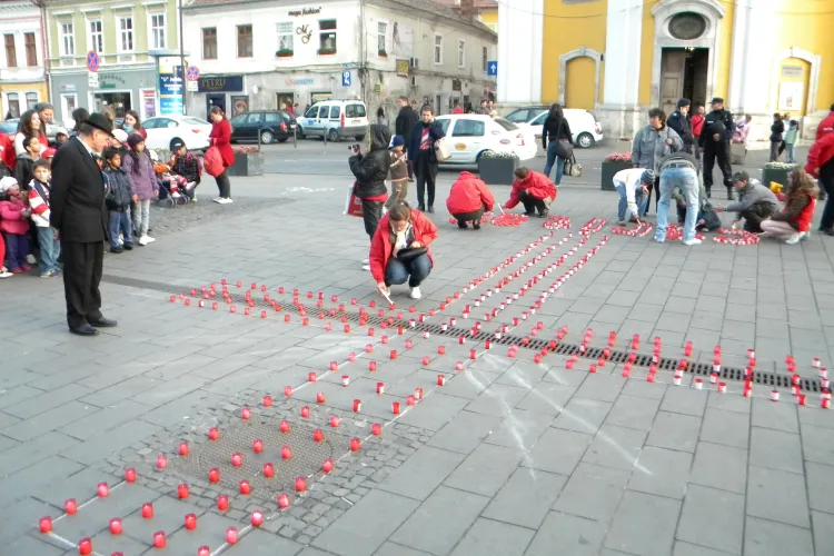 Lumânări aprinse pe Bulevardul Eroilor de Asociația Caritas în cadrul proiectului ”Un milion de stele” - FOTO