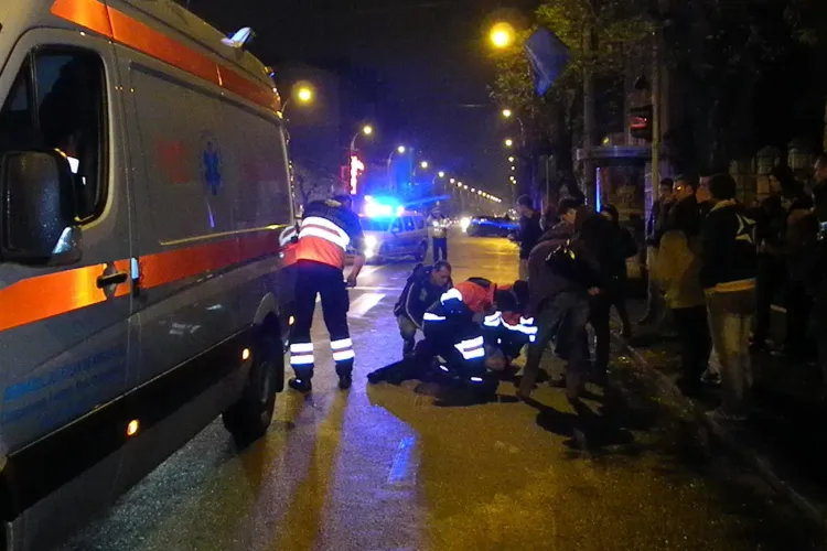 Suporter U Cluj bătut de țigani pe Dorobanților. A sărit în stradă pentru a scăpa, dar a fost lovit grav de un BMW - VIDEO