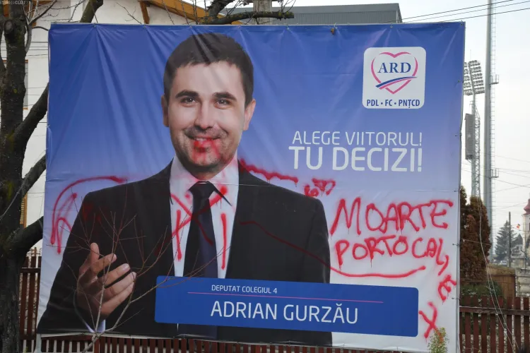 Afișele lui Adrian Gurzău, vandalizate - FOTO
