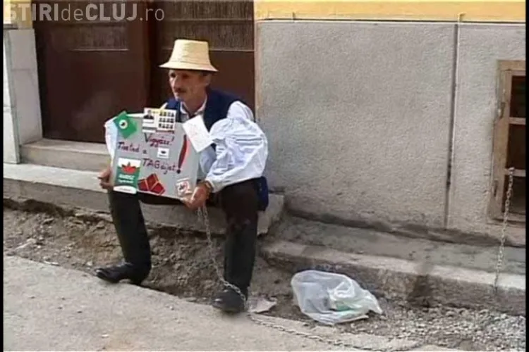 VIDEO: Un barbat din Sic s-a legat cu lanturi de sediul UDMR din Cluj. El protesteaza fata de excluderea sa din partid!
