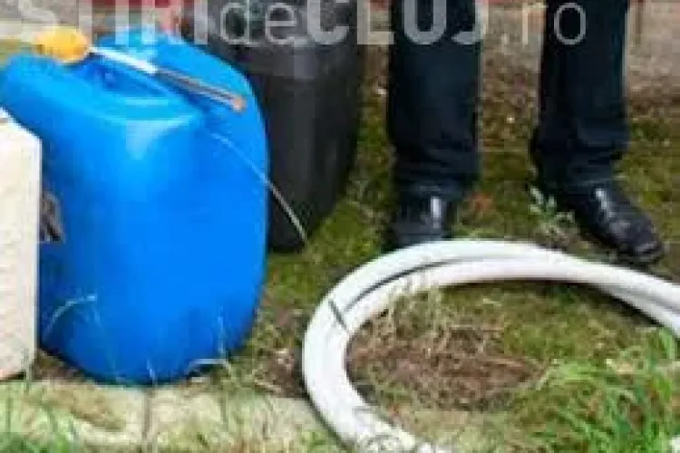 Mecanic din Dej, prins în flagrant când fura motorină. A vrut să le dea mită polițiștilor pentru a scăpa