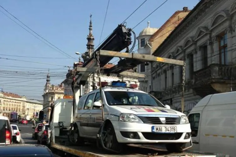 ”Hingherii de mașini” din Cluj au ridicat și un Logan al IPJ Cluj - FOTO