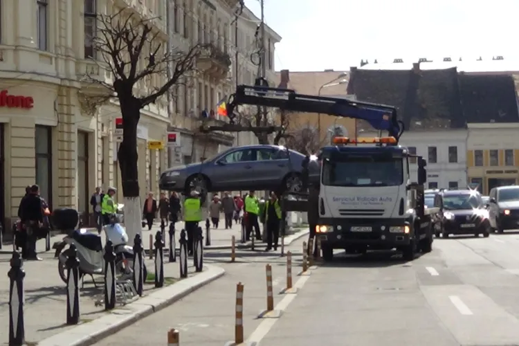 L-au ”pescuit” din ușă de la Vodafone - Piața Unirii. Cine l-a raportat? - FOTO