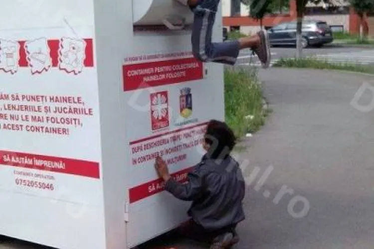 Un puști fură haine la Dej, din containerul pentru persoane sărmane - FOTO