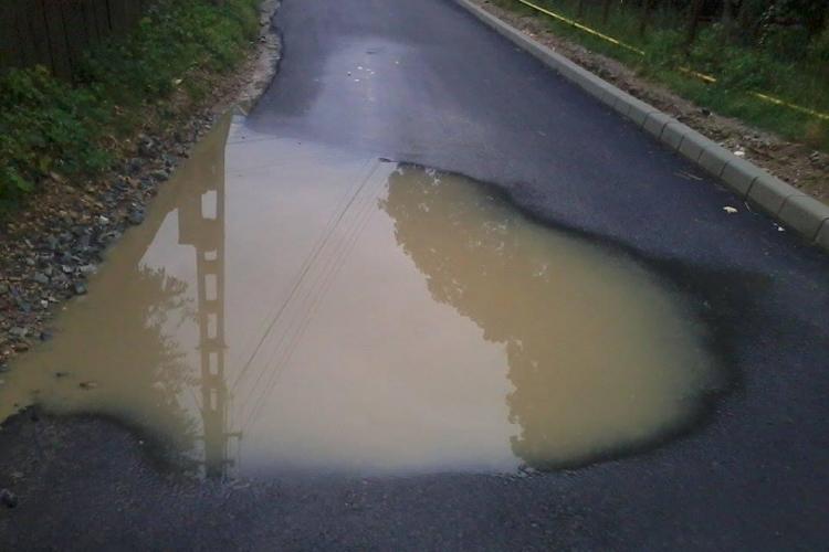 Cum se asfaltează străzile în Gilău? - FOTO