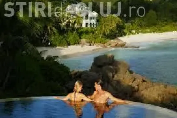 Ești curios cât costă o cameră, în plin sezon, pentru două persoane în Seychelles? Vezi AICI