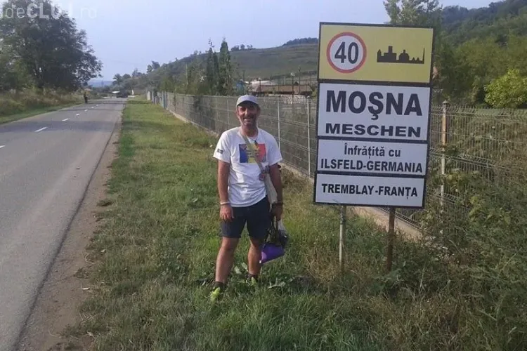 Românul care merge pe jos până la Bruxelles a ajuns la Cluj - FOTO