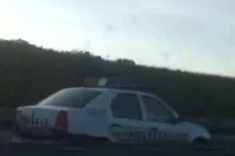 Mașina de Poliție circulă pe contrasens pe Autostrada Transilvania! Au pornit și girofarul ca șmecherii - FOTO