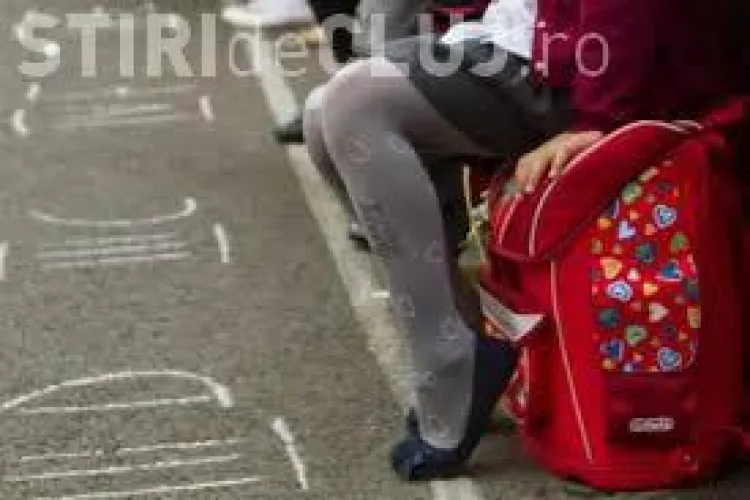 Romii din Cluj cer ghiozdane și haine de școală din bani europeni