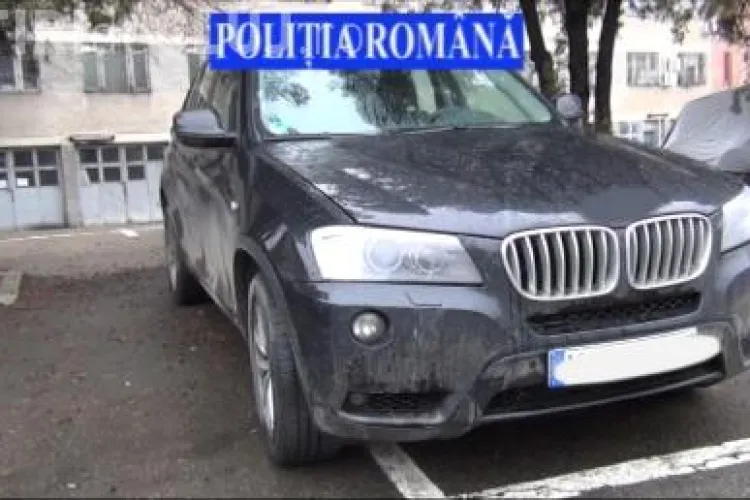 Percheziții la un hoț de mașini la Cluj. Încerca să vândă un BMW furat din Germania VIDEO
